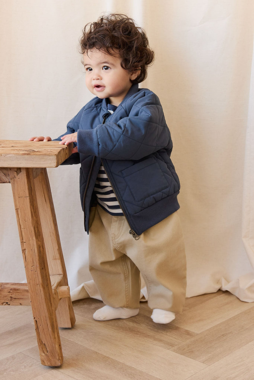Veste matelassée en losanges en nylon-coton recyclé marine avec fermeture éclair pour enfant, idéale pour les activités de plein air