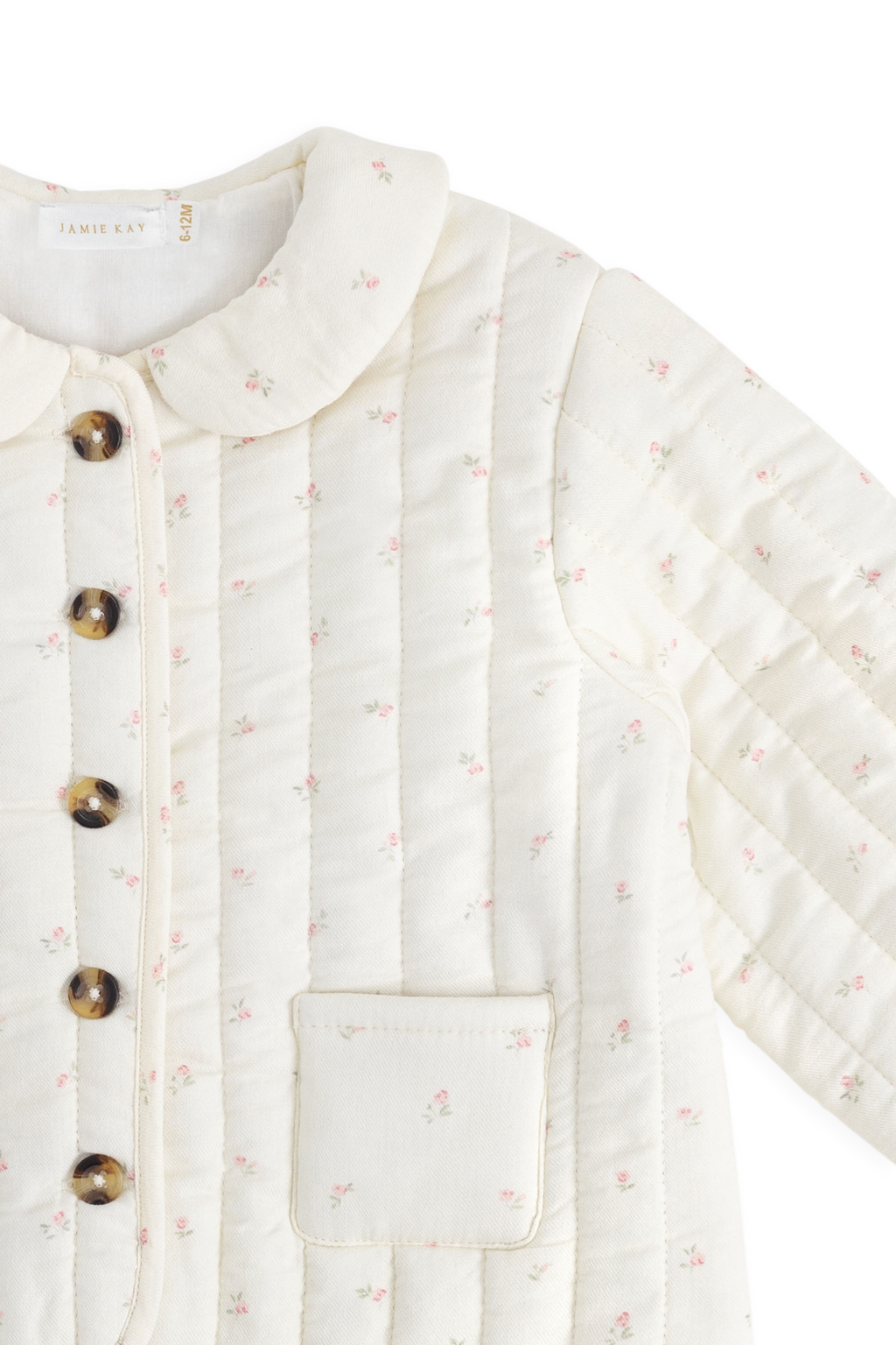 Veste matelassée en coton biologique rose et florale avec col claudine pour filles